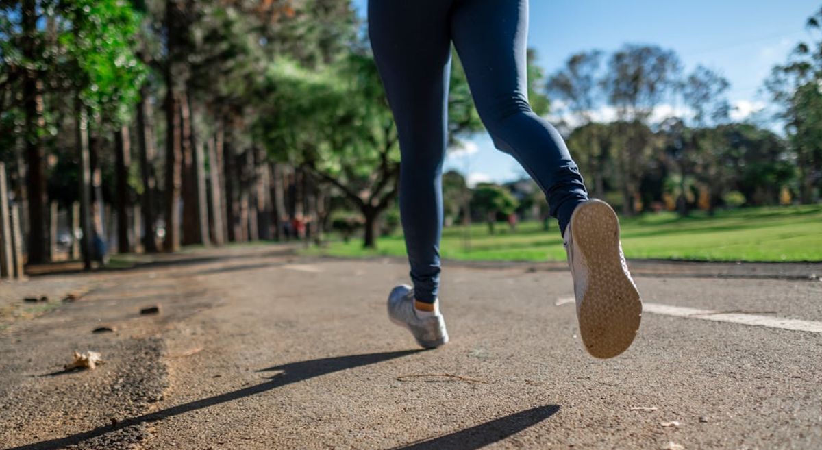 Picture of a person running outside. 